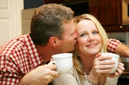 happy-couple-with-coffee-cups.jpg